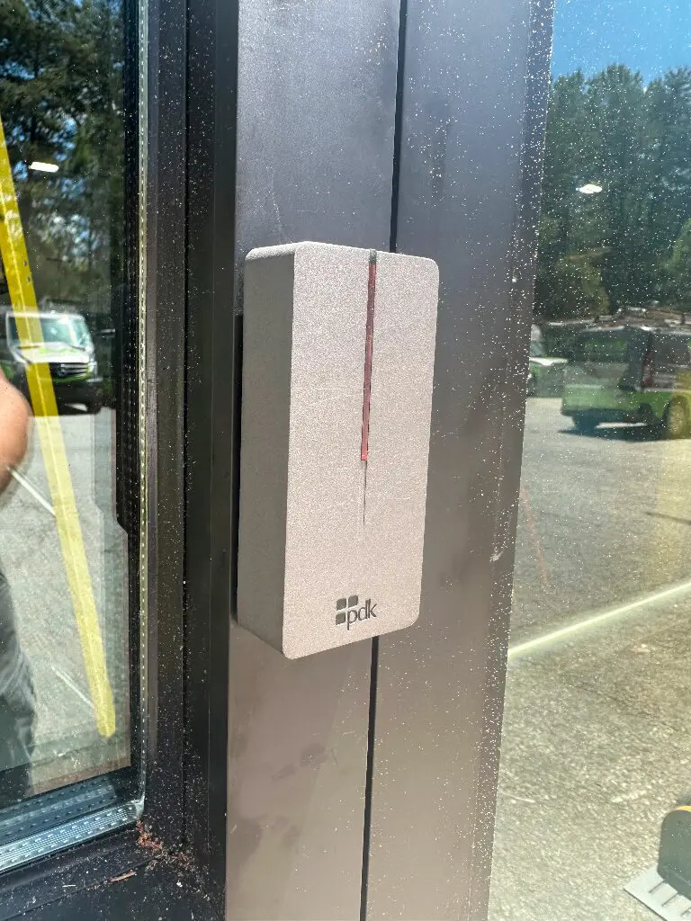 PDK access card reader on glass door