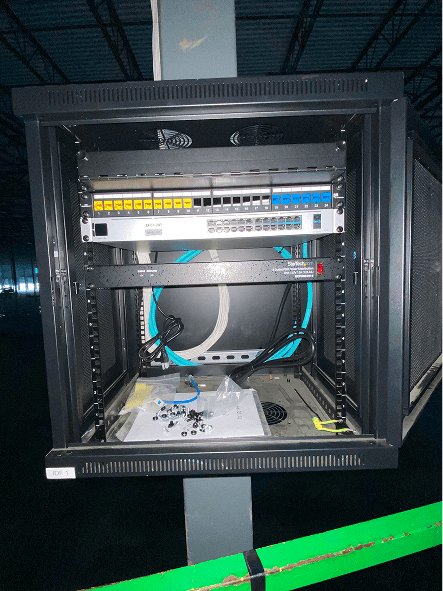 Open wall mounted network rack with patch panel