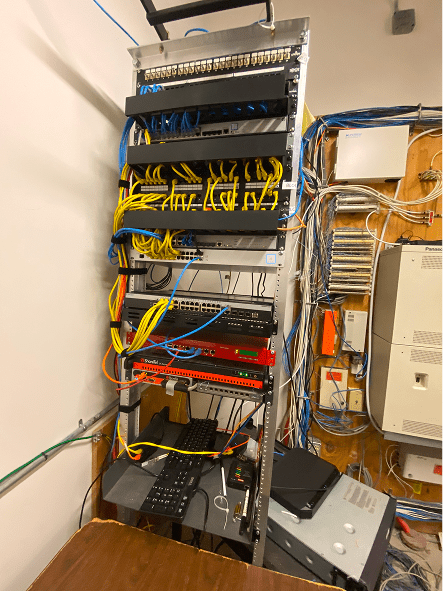 Network rack with switches, patch panels, cables