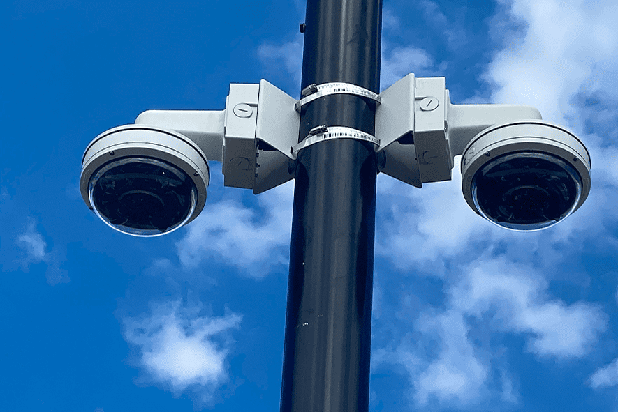 Dual dome security cameras on pole
