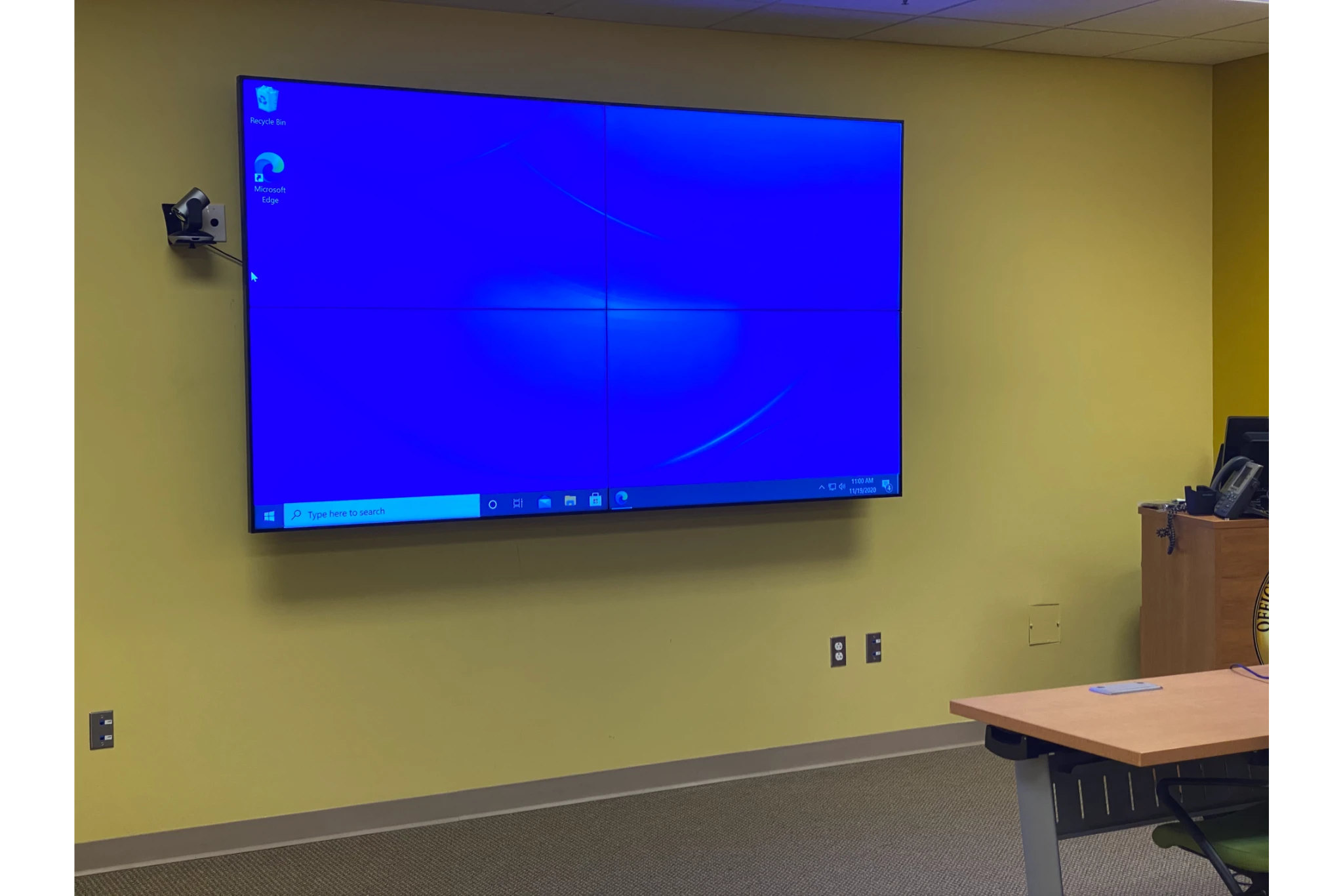 Conference room with large wall-mounted display