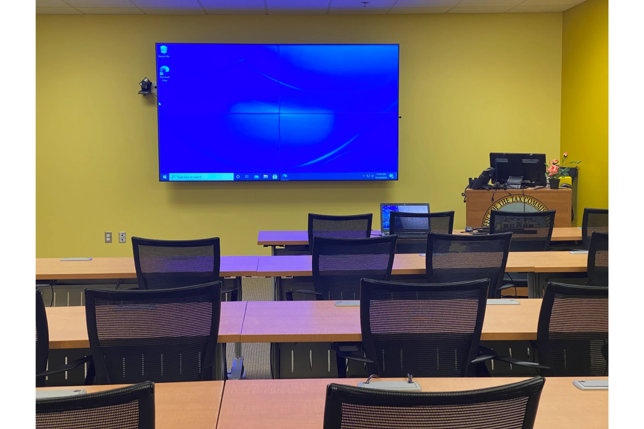 Empty training room with large wall display