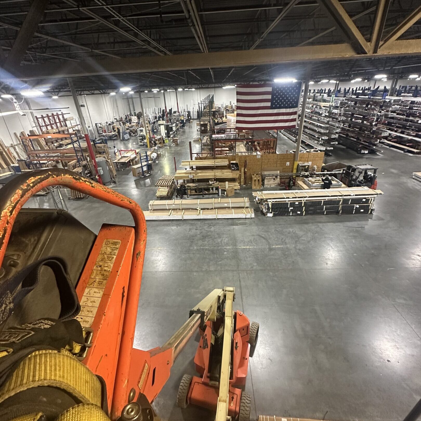 View from lift over warehouse with American flag